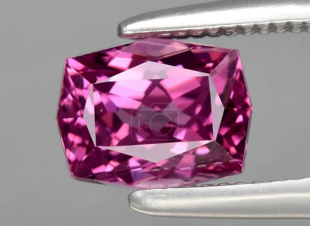 Photo for Natural pink malaya garnet gem on background - Royalty Free Image