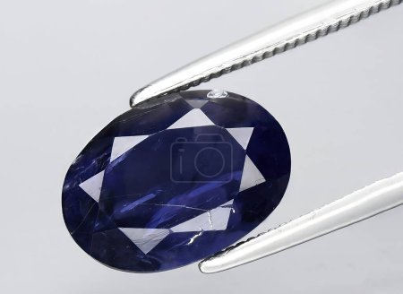Photo for Natural blue iolite gem on background - Royalty Free Image