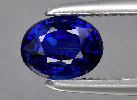Photo for Natural blue sapphire gem on background - Royalty Free Image