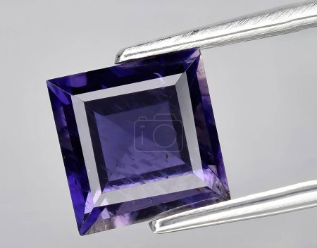 Photo for Natural blue iolite kordierite gem on background - Royalty Free Image