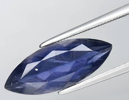 Photo for Natural blue violet iolite gem on background - Royalty Free Image