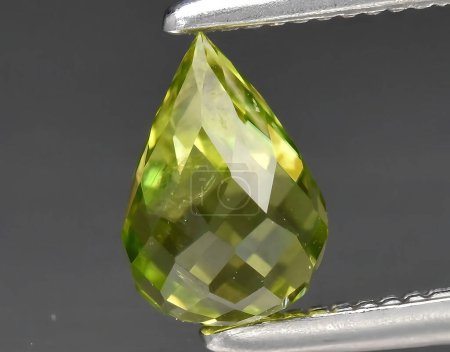 natural green peridot olivine gem on background