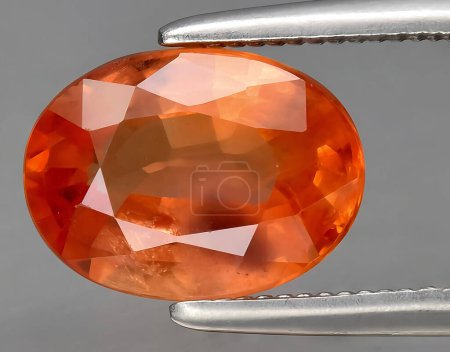 Téléchargez les photos : Naturel orange padparadscha gemme de saphir sur fond - en image libre de droit