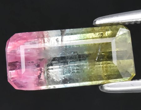 Photo for Natural multi color tourmaline gem on background - Royalty Free Image