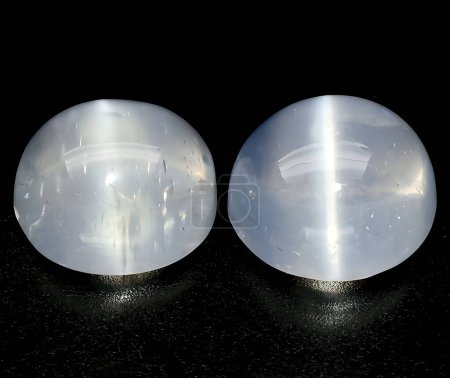 Photo for Natural moonstone with cats eye gem on background - Royalty Free Image