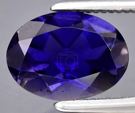 Photo for Natural blue biolet iolite gem on background - Royalty Free Image