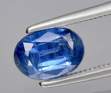 natural blue kyanite gem on background