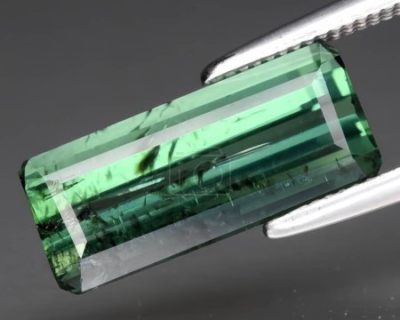 Photo for Natural green tourmaline gem on background - Royalty Free Image