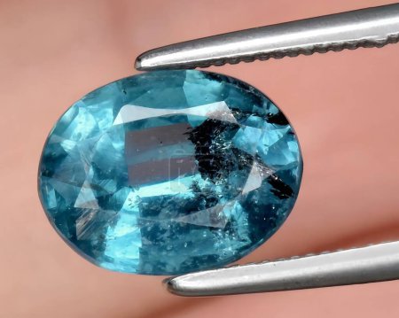 natural blue iolite gem on background