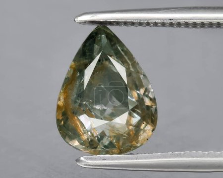 natural green sapphire gem on background