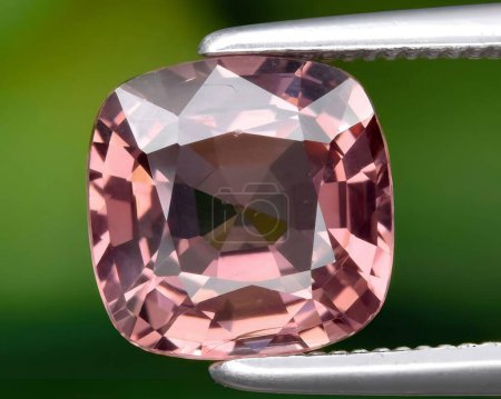 natural pink spinel gem on background