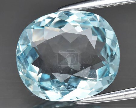 natural light blue aquamarine beryl gem on background