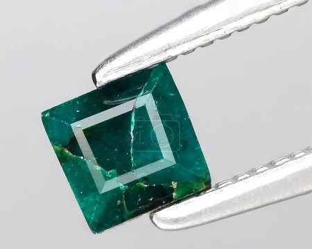 natural green dioptase gem on background