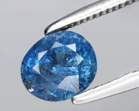 natural blue indicolite tourmaline gem on background