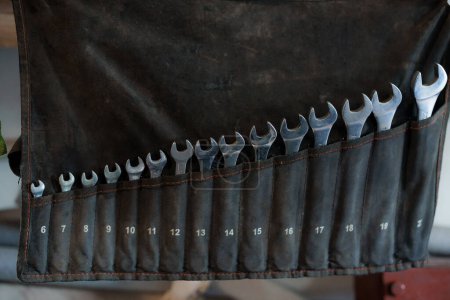 Set of open-end wrenches in a black case