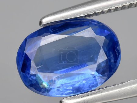 natural blue kyanite gemstone on background
