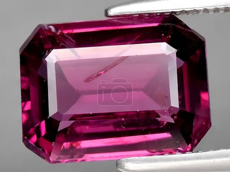 Photo for Natural pink rhodolite garnet gemstone on background - Royalty Free Image