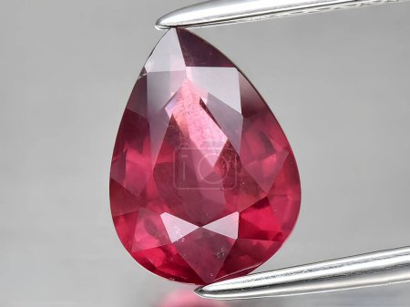 Photo for Natural pink rhodolite garnet gemstone on background - Royalty Free Image