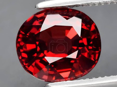 natural red rhodolite garnet gemstone on background