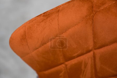 Orange Stoff Hintergrund. Orangefarbener Stoff für Möbel