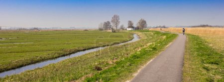 Panorama of a bicycle path in the nature area Purmerland, Netherlands