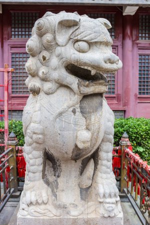 Guarding lion at the temple of the Tianhou Palace in Tianjin, China