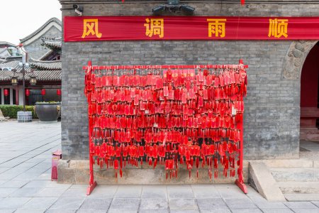 Red prayer tablets on the wall of the Tianhou temple in Tianjin, China