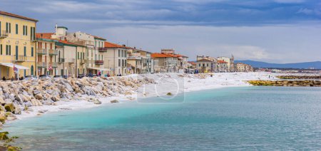 Panorama of colorful houses at the sea in Marina di Pisa, Italy