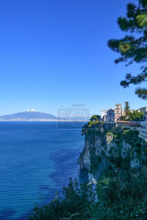 Photo for The Vesuvius volcano stands out over the gulf of Naples. Landscape from the town of Vico Equense, Italy. - Royalty Free Image