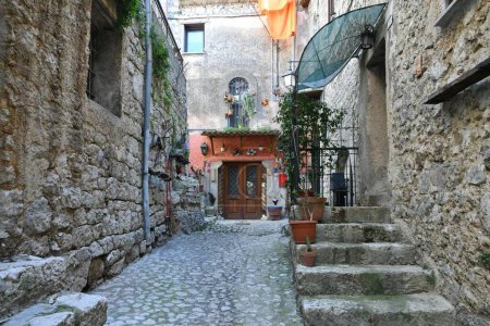 Photo for A narrow street among the old houses of Fumone, a historic town in the state of Lazio in Italy. - Royalty Free Image