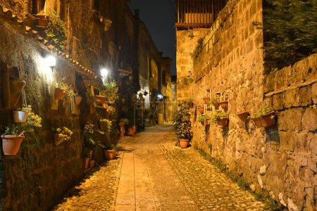 Photo for A narrow street at night in Casertavecchia, a medieval village in the Campania region, Italy. - Royalty Free Image