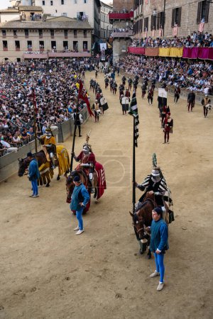 Photo for Siena, Italy - August 17 2022: Knights representing the Abolished Contrade Quercia or Oak, Spadaforte, Vipera or Viper at the Corteo Storico Historical Costume Parade of the Palio di Siena - Royalty Free Image