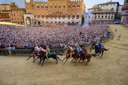 Photo for Siena, Italy - August 17 2021: Mossa or Start of the Public Horse Race Palio di Siena on the Main Square - Royalty Free Image