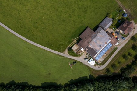 Photo for Panorama aerial view of the green Swiss hills on a summers day with blue skies. Nobody inside - Royalty Free Image