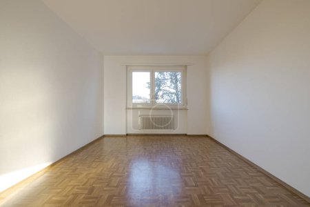 Photo for Interior of an empty room, front view with a window at the back. Large space - Royalty Free Image
