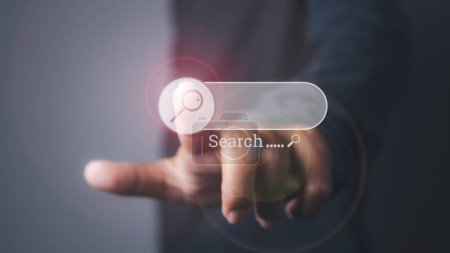 Photo for Searching browsing internet data information networking concept. Search Engine Optimization SEO Networking. Businessman presses information search button on search bar virtual screen. copy space. - Royalty Free Image