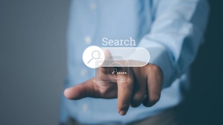 Photo for Searching browsing internet data information networking concept. Search Engine Optimization SEO Networking. Businessman presses information search button on search bar virtual screen. copy space. - Royalty Free Image