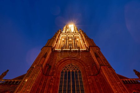 Photo for Tower of the historical Eusebius church in Arnhem at night - Royalty Free Image
