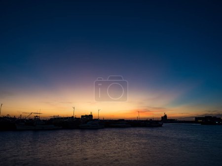 Photo for Hsinchu fishing port under sunset - Royalty Free Image