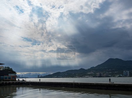 Foto de New Taipei City, Taiwan - November 27,2022: Beautiful landscape of Tamsui on November 27,2022 in New Taipei City, Taiwan.It's popular with visitors from Taipei and boasts many historical attractions. - Imagen libre de derechos