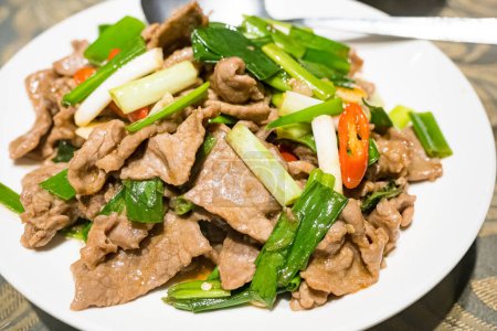 Photo for Scallion beef stir fry with green onions - Royalty Free Image