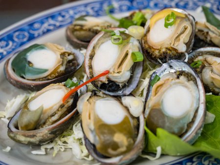 Photo for Closeup of Delicious steamed abalones. - Royalty Free Image