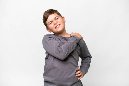 Photo for Little caucasian kid over isolated white background suffering from pain in shoulder for having made an effort - Royalty Free Image