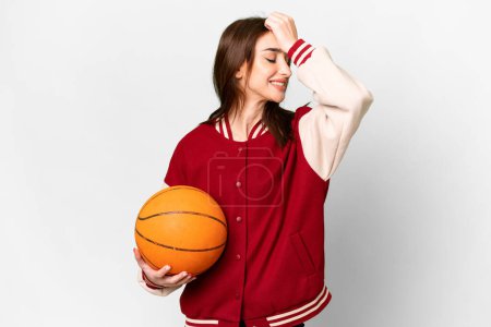 Photo for Young basketball player woman over isolated white background smiling a lot - Royalty Free Image