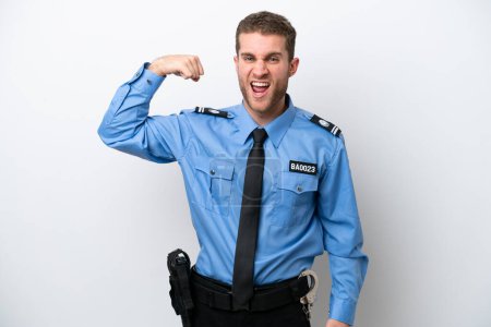Foto de Young police caucasian man isolated on white background doing strong gesture - Imagen libre de derechos