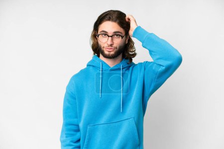 Photo for Young handsome man over isolated white background with an expression of frustration and not understanding - Royalty Free Image