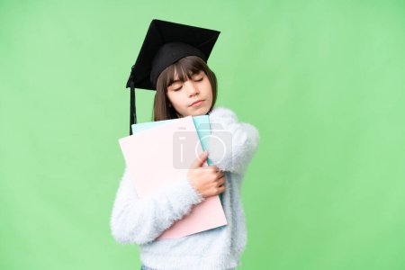 Photo for Little caucasian student girl over isolated background suffering from pain in shoulder for having made an effort - Royalty Free Image