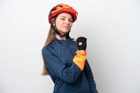 Photo for Young cyclist Lithuanian woman isolated on white background proud and self-satisfied - Royalty Free Image