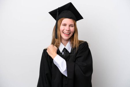Téléchargez les photos : Jeune diplômée universitaire Anglaise isolée sur fond blanc célébrant une victoire - en image libre de droit