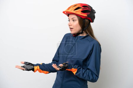 Photo for Young cyclist Lithuanian woman isolated on white background with surprise expression while looking side - Royalty Free Image